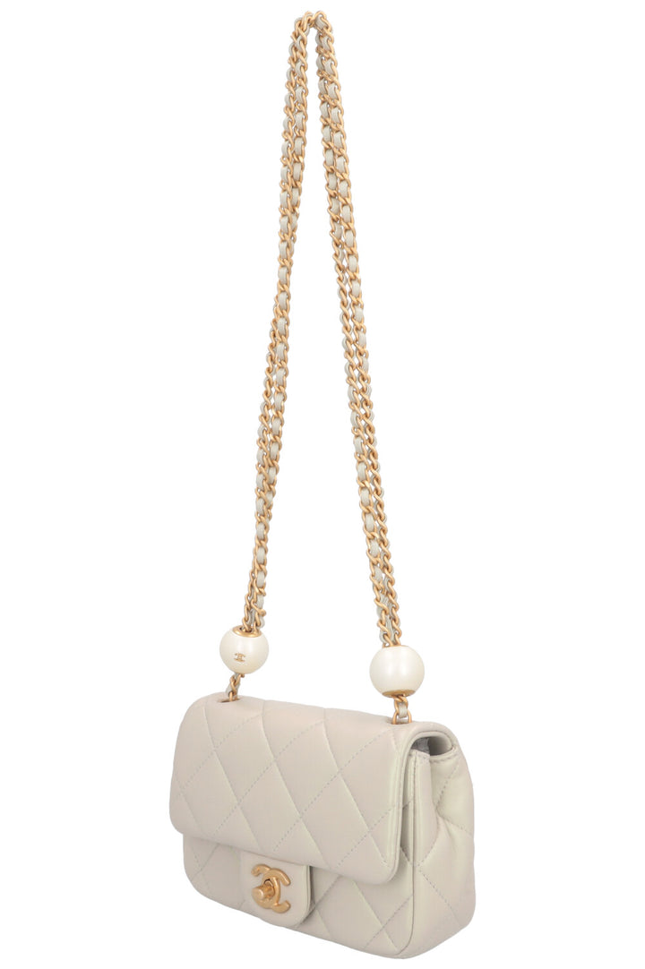 Sac à rabat CHANEL Mini Pearl Crush irisé