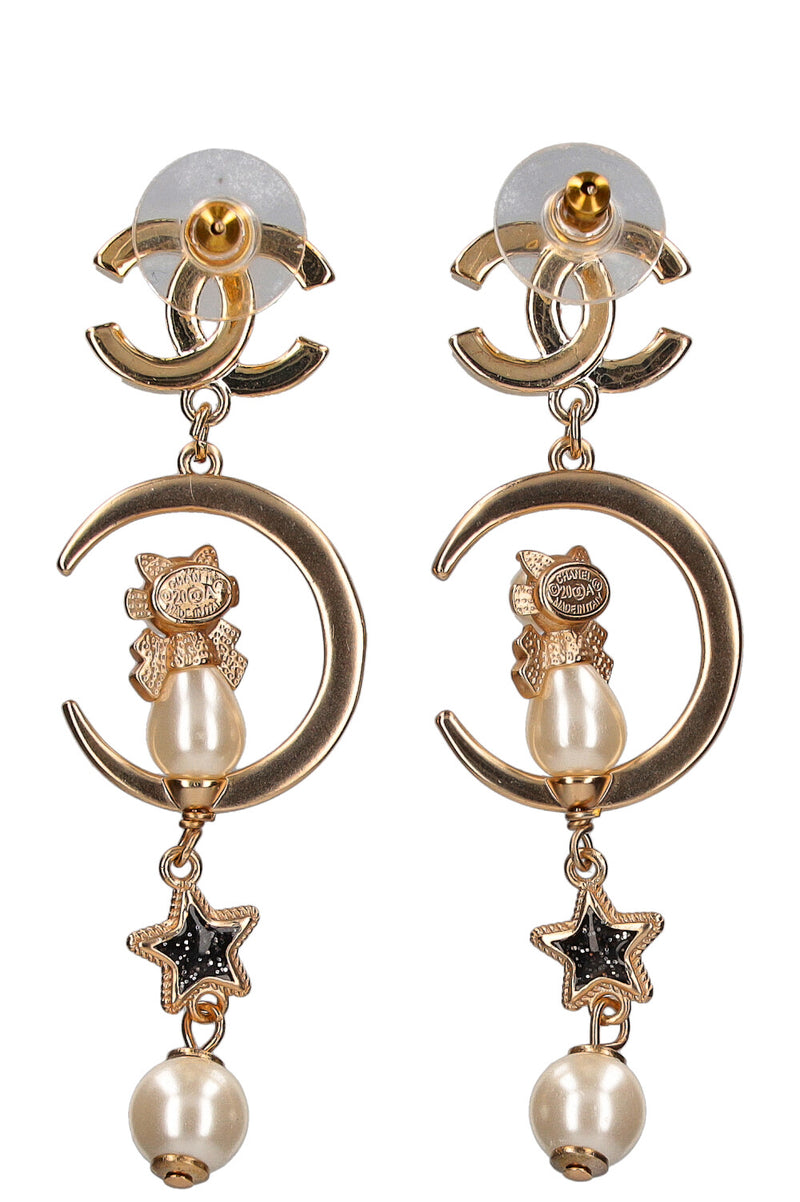 Chanel moon earrings top
