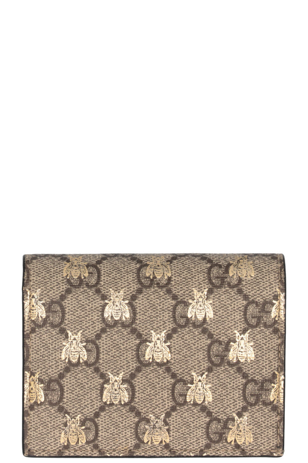 Portefeuille compact GUCCI Supreme GG Bee