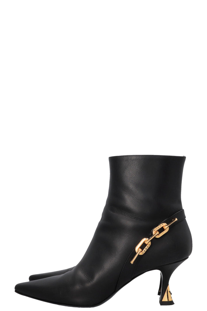 Bottines à chaîne pailletée LOUIS VUITTON noires