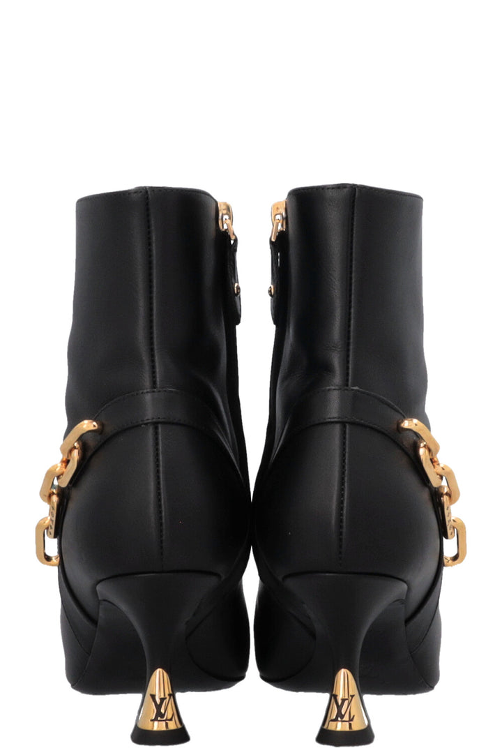 Bottines à chaîne pailletée LOUIS VUITTON noires