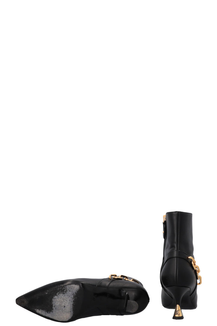 Bottines à chaîne pailletée LOUIS VUITTON noires