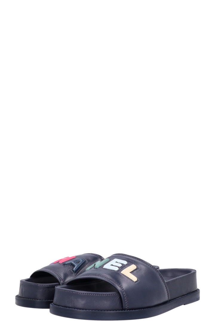 CHANEL Logo Embossed Slides Navy Multicolor