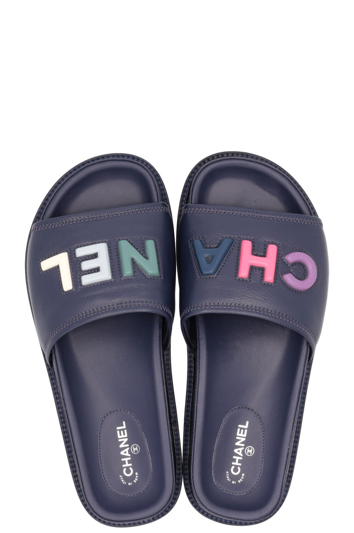 CHANEL Logo Embossed Slides Navy Multicolor