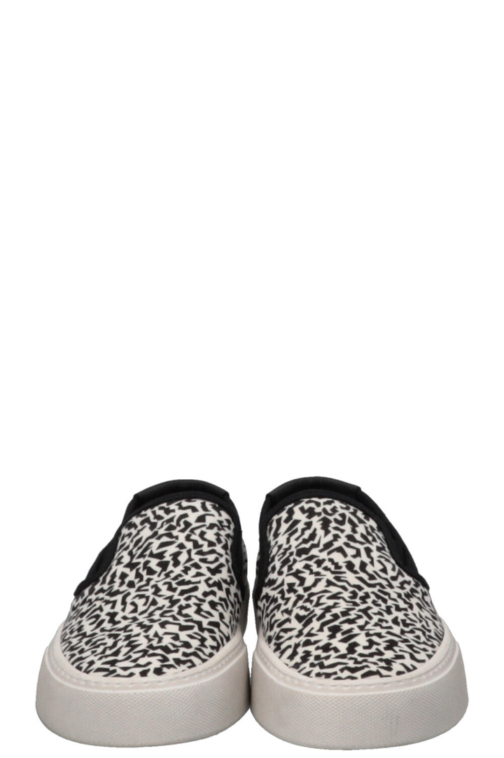 SAINT LAURENT Chaussures plates à enfiler en toile blanche