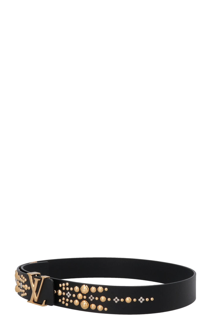 Ceinture LOUIS VUITTON noire à initiales LV cloutées.