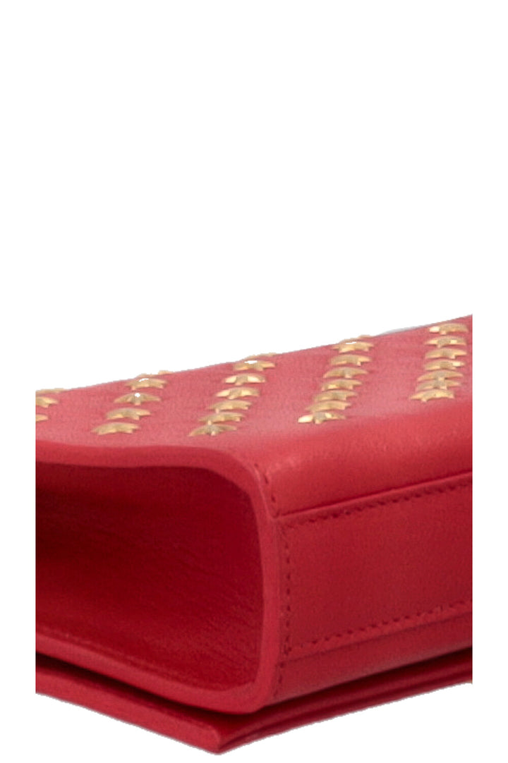 Sac bandoulière SAINT LAURENT WOC Kate à pompon étoile rouge