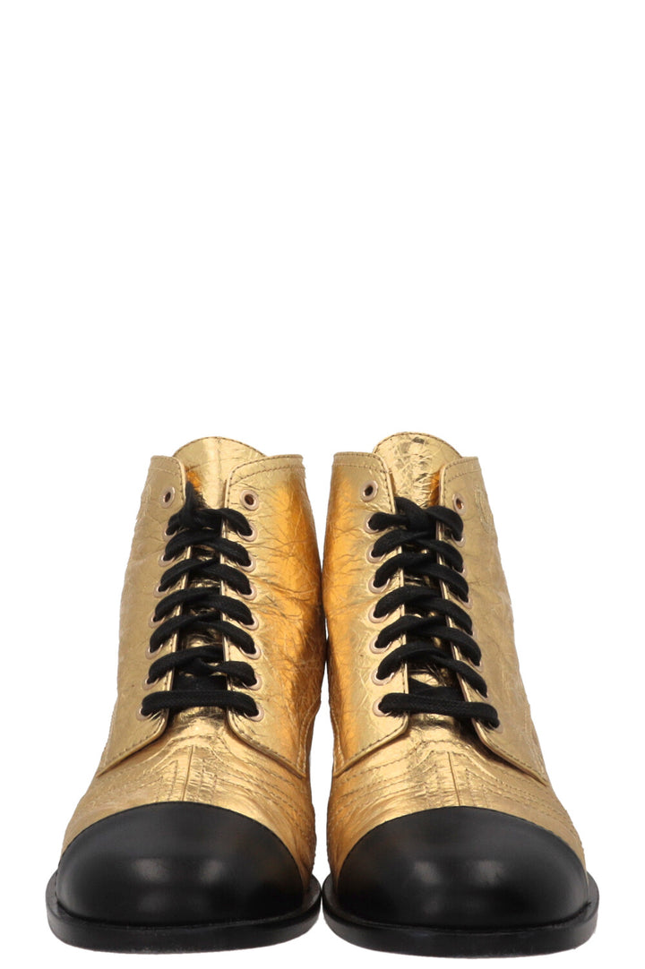 CHANEL CC Bottines à lacets en cuir doré et noir, veau doré