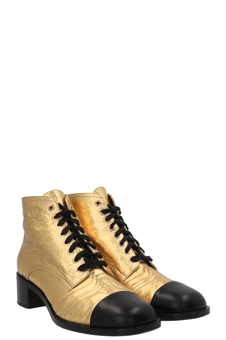 CHANEL CC Bottines à lacets en cuir doré et noir, veau doré