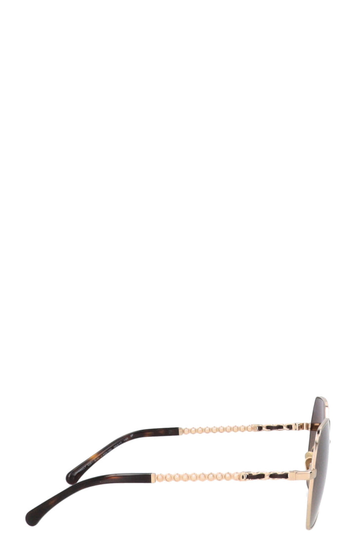 Lunettes de soleil CHANEL chaîne dorée 4281