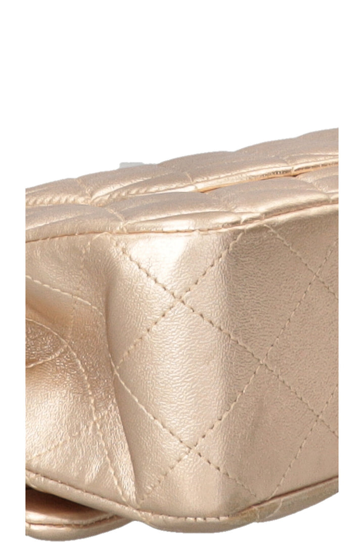CHANEL Double Flap Bag Medium Cuir Métallisé Champagne