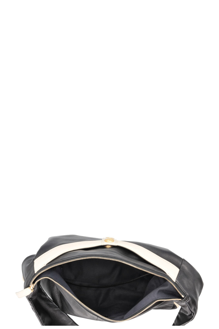 Sac Girl CHANEL en agneau noir et blanc
