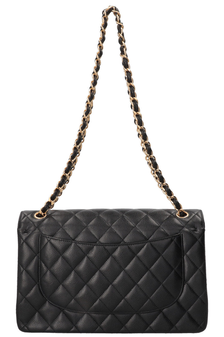 Sac à rabat doublé Chanel grand modèle en cuir caviar noir