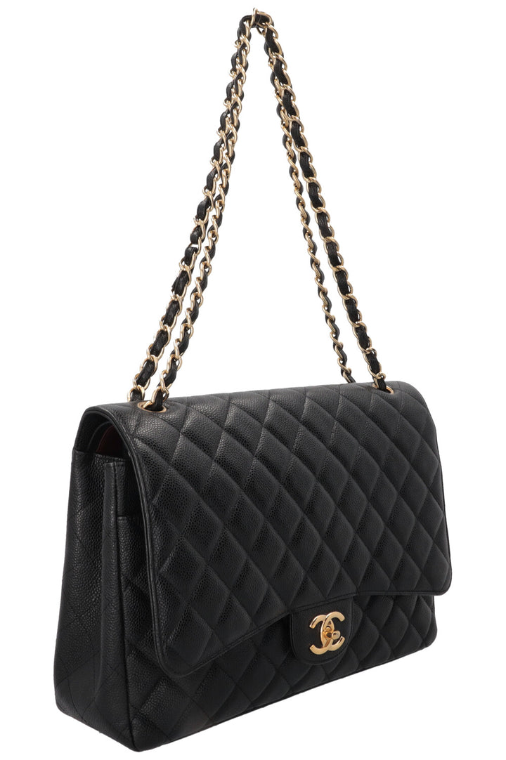 CHANEL Maxi Double Flap en cuir caviar noir