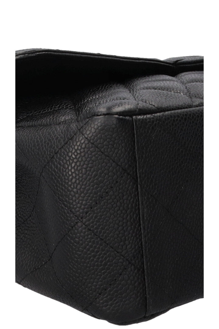 CHANEL Maxi Double Flap en cuir caviar noir
