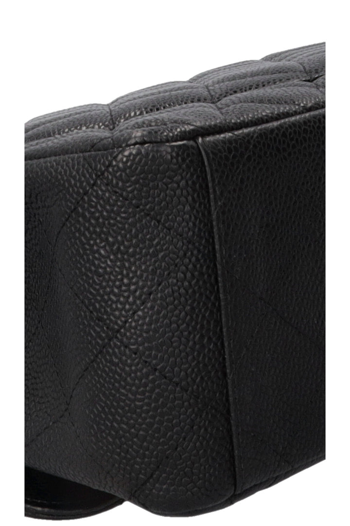 CHANEL Maxi Double Flap en cuir caviar noir