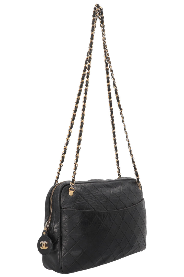 Sac bandoulière CHANEL Vintage matelassé médaillon en cuir noir