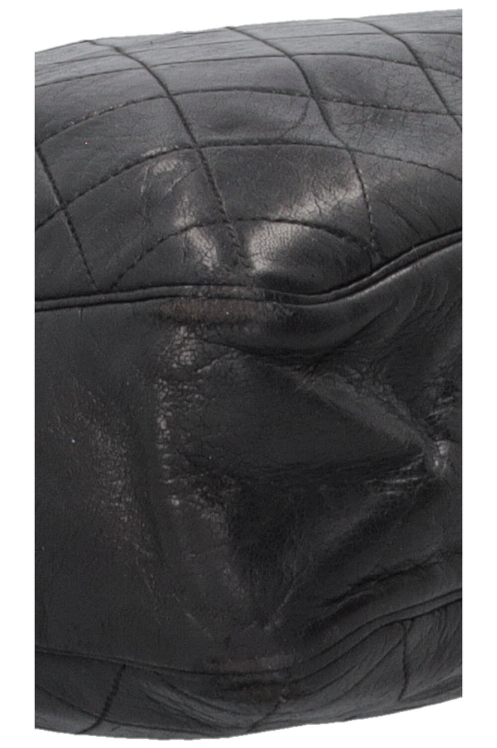 Sac bandoulière CHANEL Vintage matelassé médaillon en cuir noir
