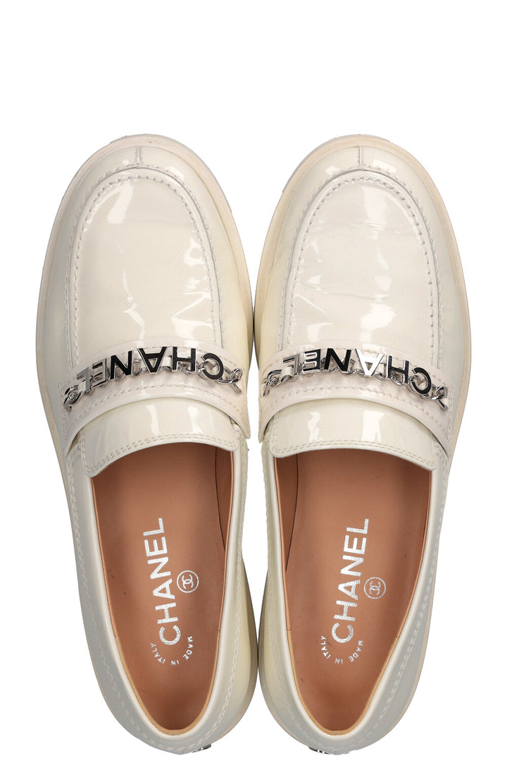 CHANEL Logo Patent Flats White