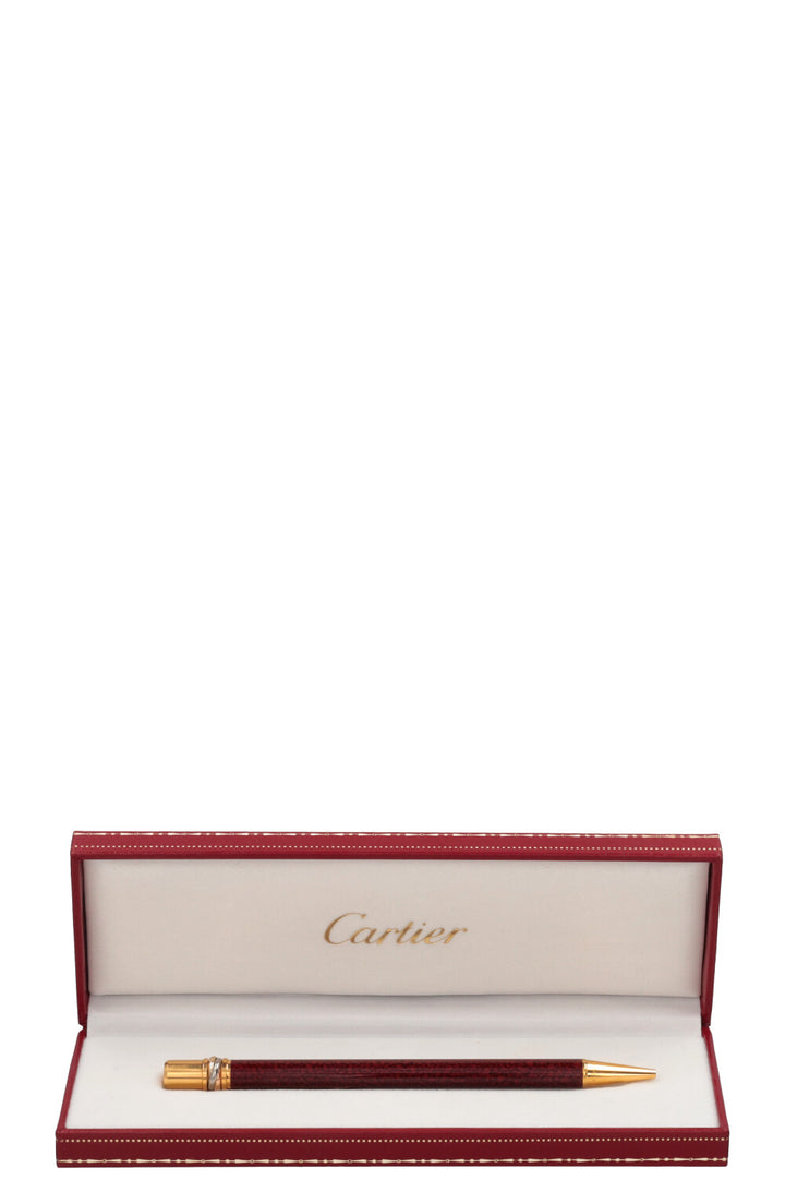 CARTIER Must de Cartier Trinity Stylo bille bordeaux doré