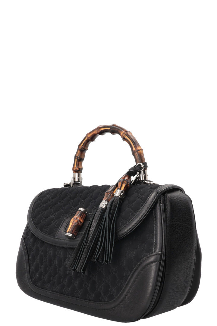 Sac GUCCI 1947 en néoprène avec anse en bambou et motif GG noir