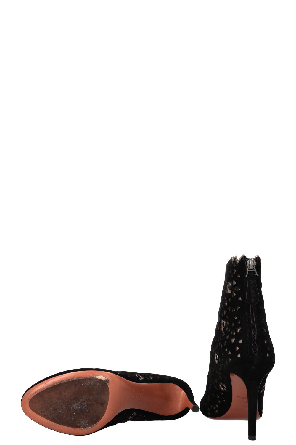Bottines ALAIA découpées au laser en daim noir doré
