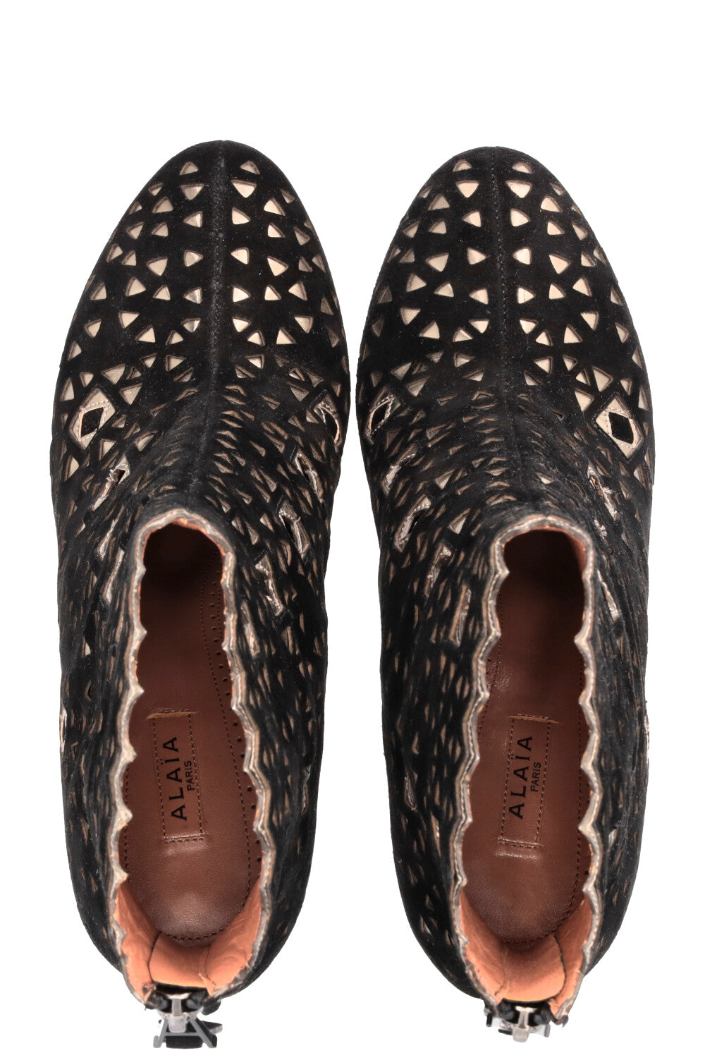 Bottines ALAIA découpées au laser en daim noir doré