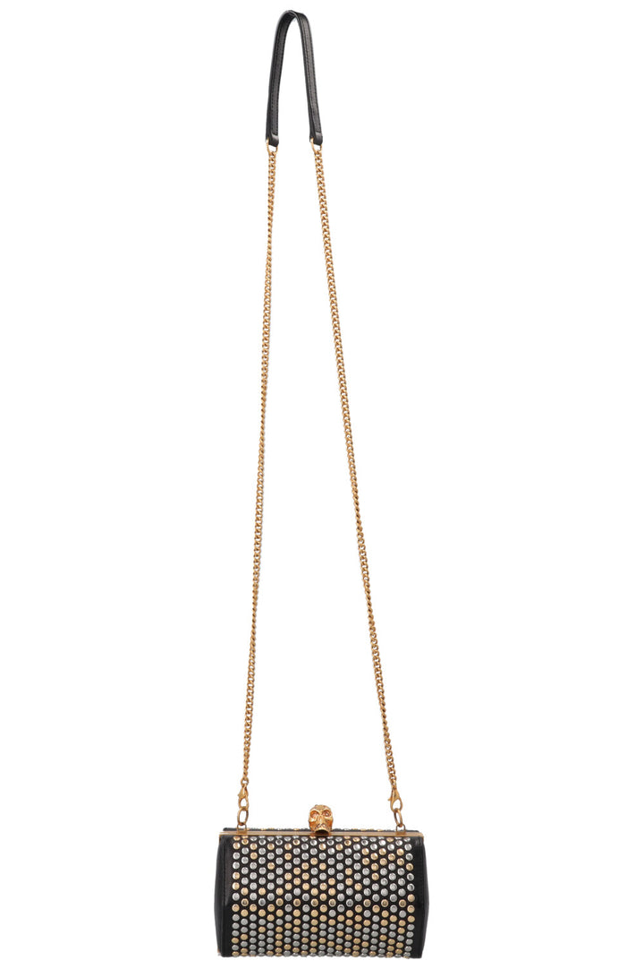 Pochette cloutée ALEXANDER MCQUEEN en cuir noir, or et argent