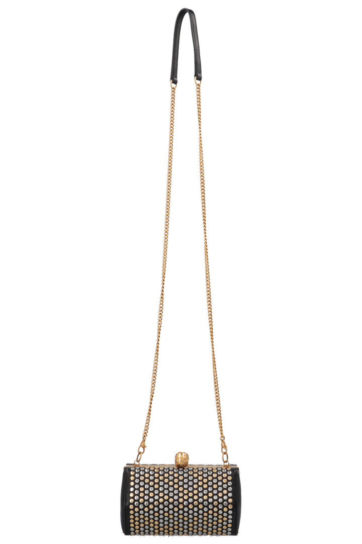 Pochette cloutée ALEXANDER MCQUEEN en cuir noir, or et argent