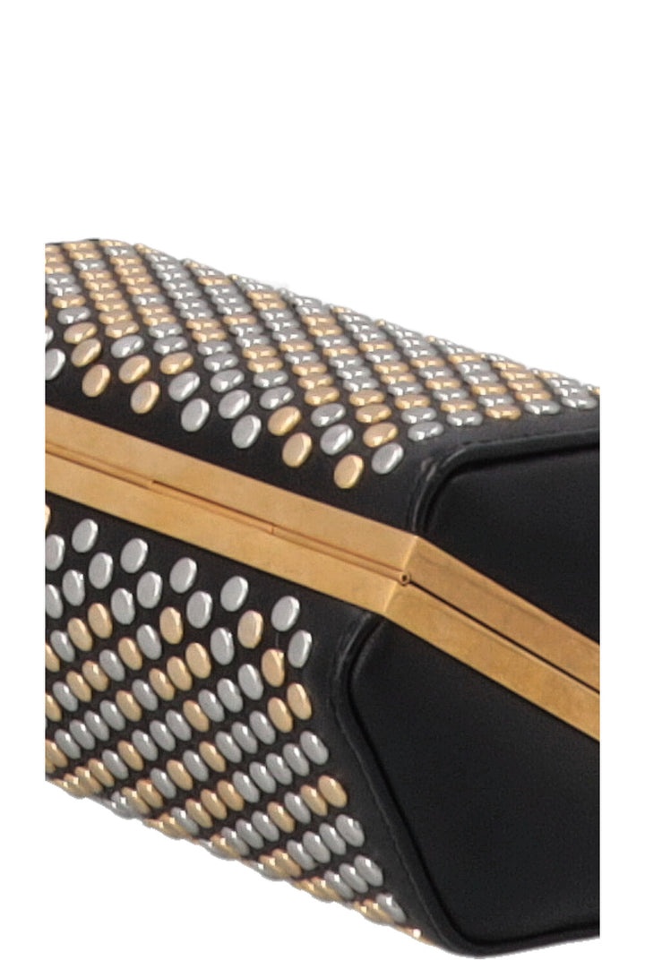 Pochette cloutée ALEXANDER MCQUEEN en cuir noir, or et argent