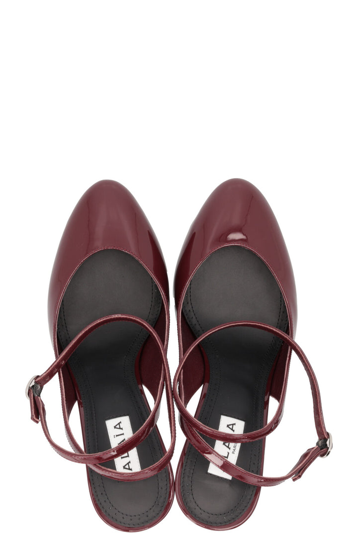 ALAÏA 90 Slingback Patent Bordeaux Pumps