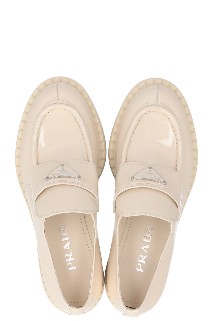 PRADA Triangle Logo Loafers Patent Ivory