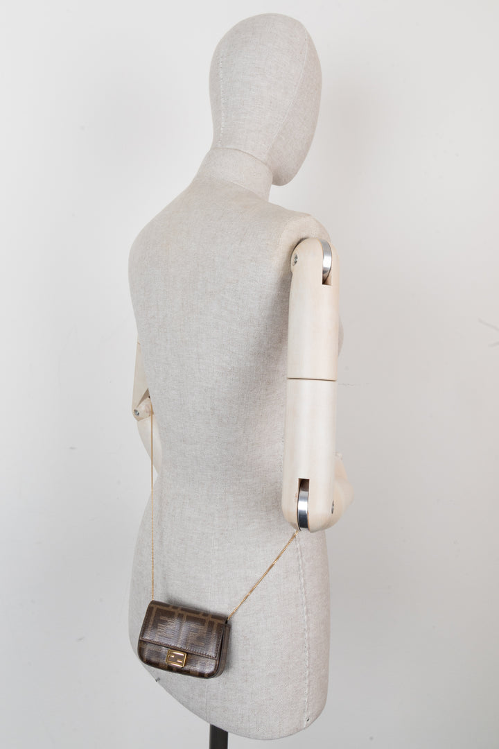 Sac à breloques FENDI Chain Baguette en toile enduite Zucca