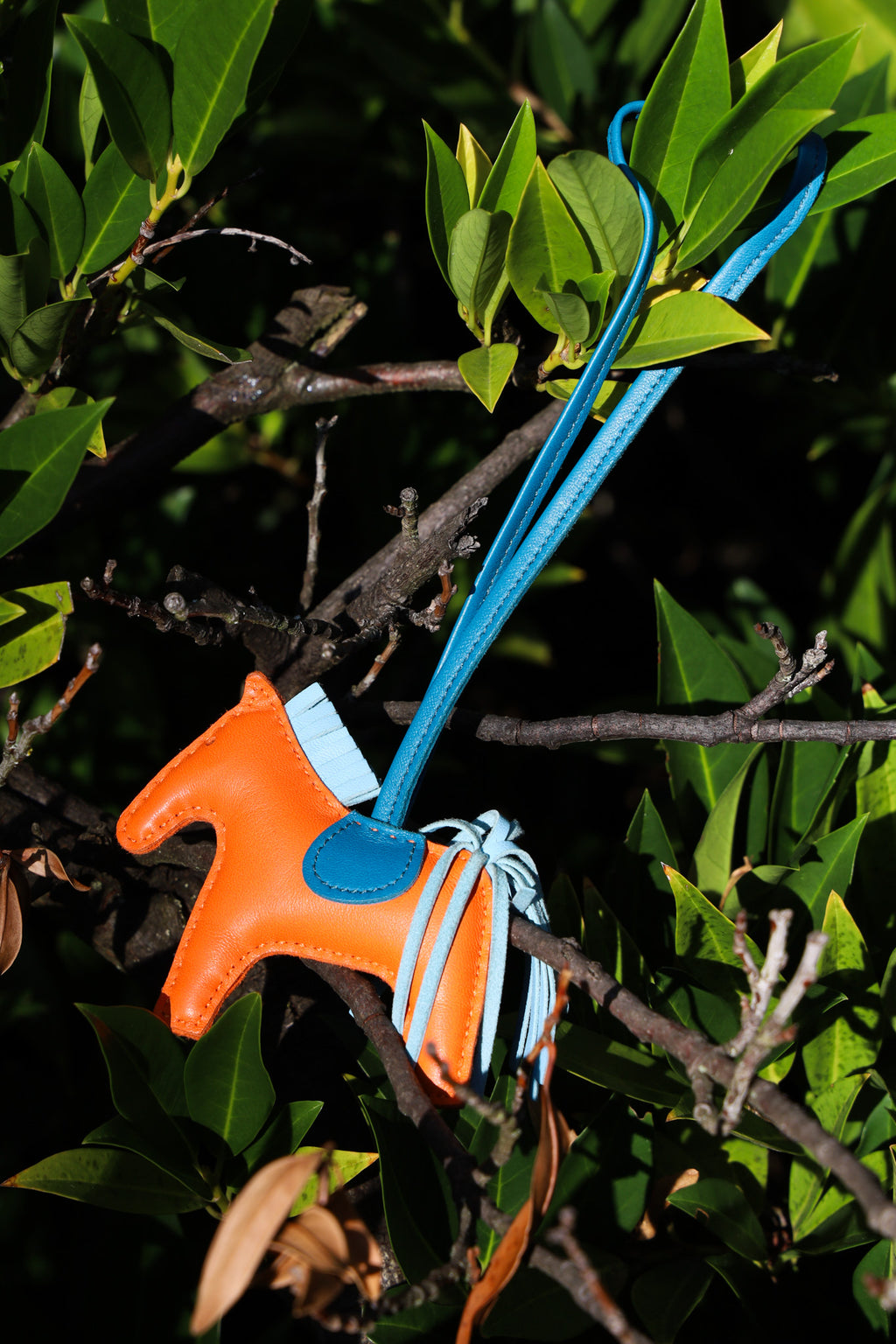 HERMÈS  Rodeo MM Bag Charm Orange & Blue