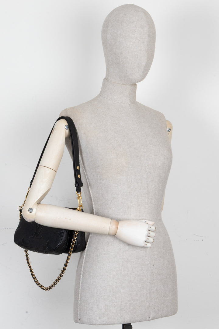 LOUIS VUITTON Multi Pochette Accessoires Cuir Empreinte Noir