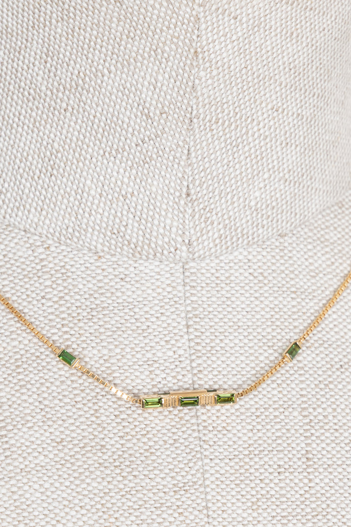 Collier GUCCI Link to Love en or 18 carats et émeraude.