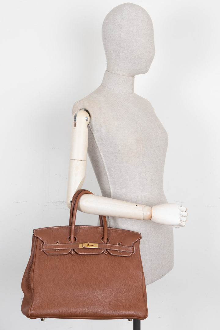 HERMÈS Birkin 35 Retourné en cuir Clémence, bijoux or