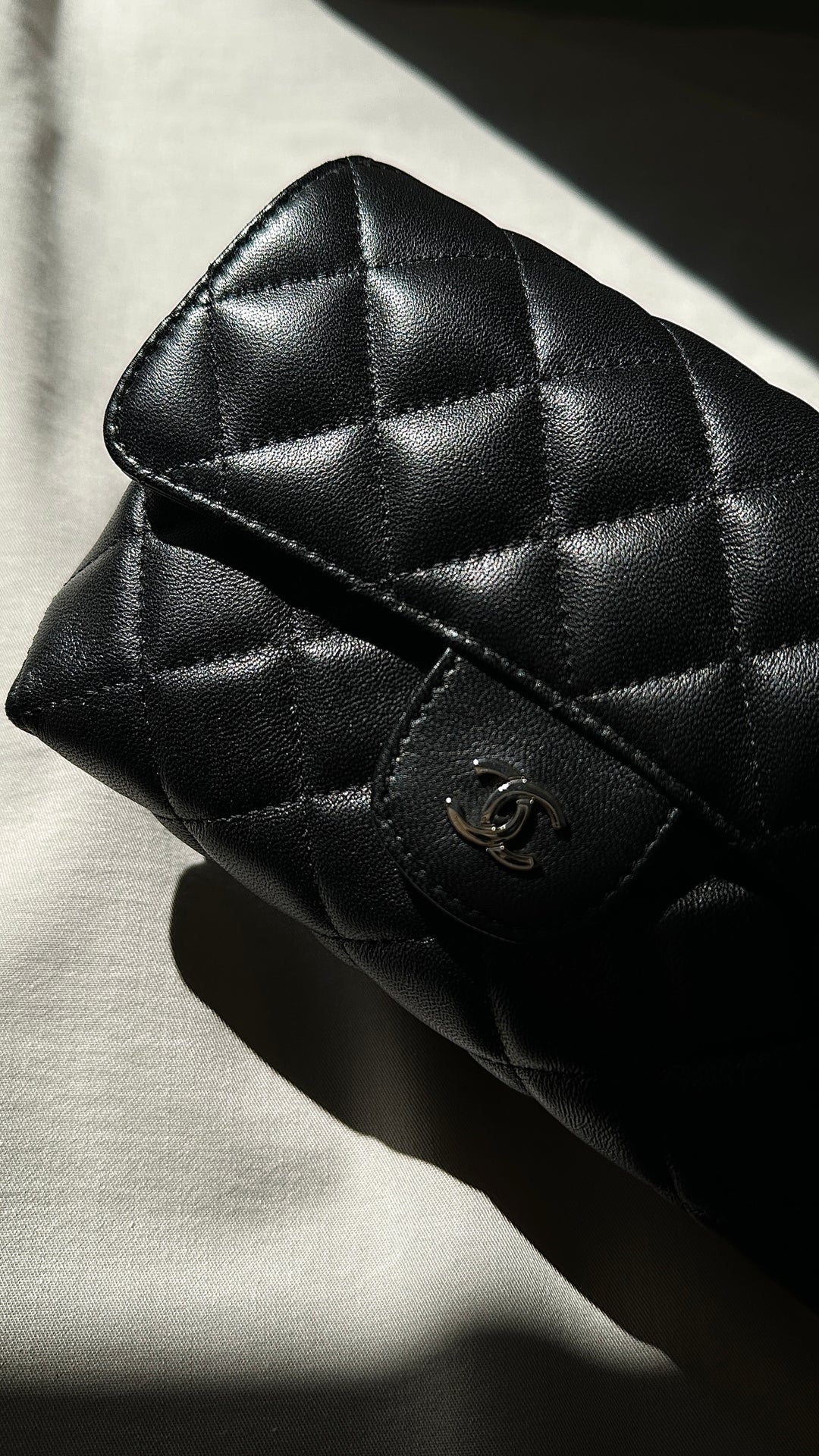 CHANEL Cosmetic Pouch Leather Black