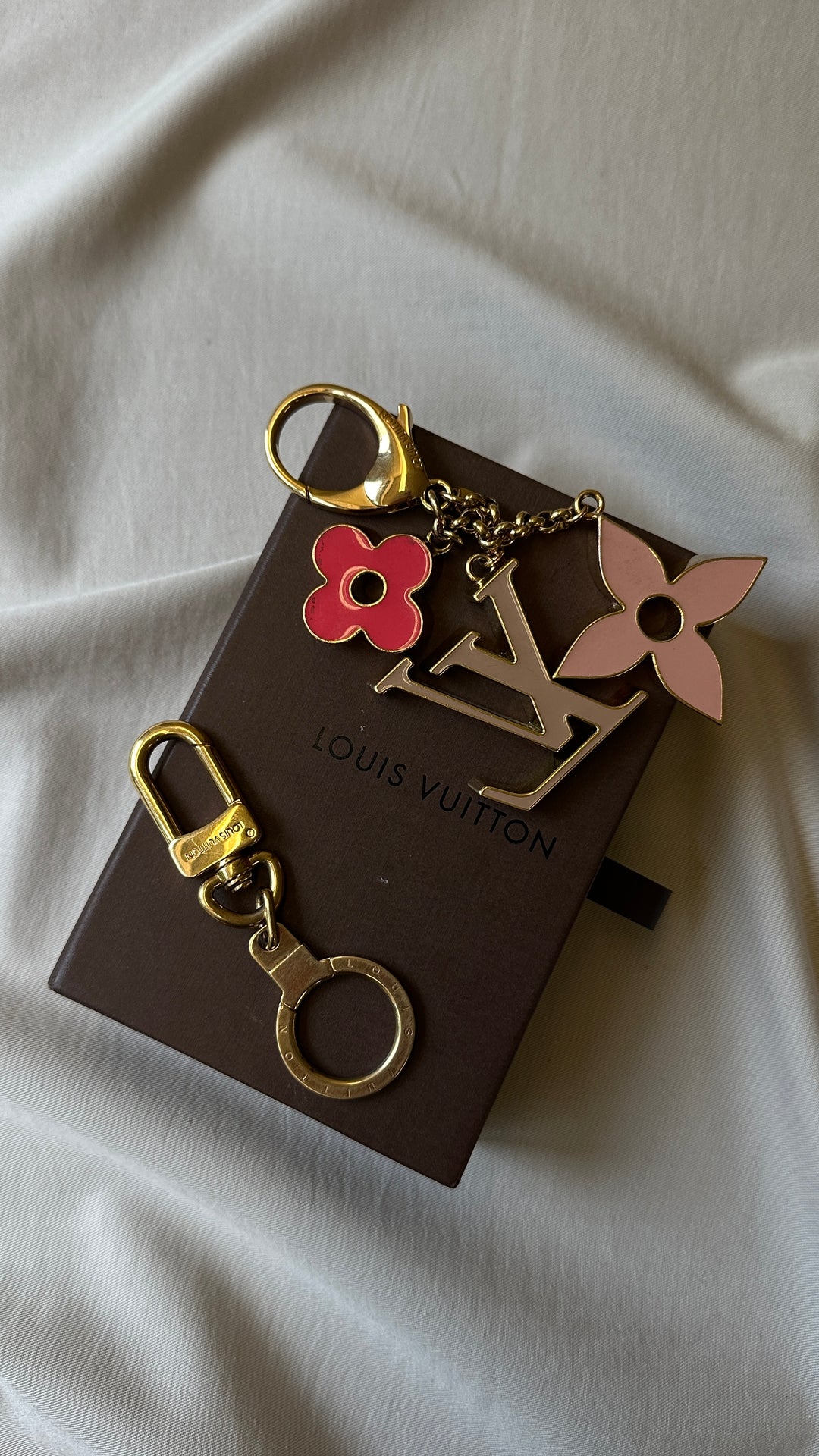 Porte-clés LOUIS VUITTON Blossom Or rose