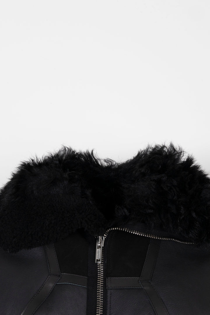 Veste en cuir noir à fermeture éclair et doublure en peau lainée RICK OWENS