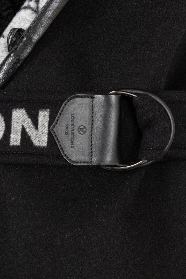 Manteau LOUIS VUITTON à col châle et ceinture en peau lainée noir