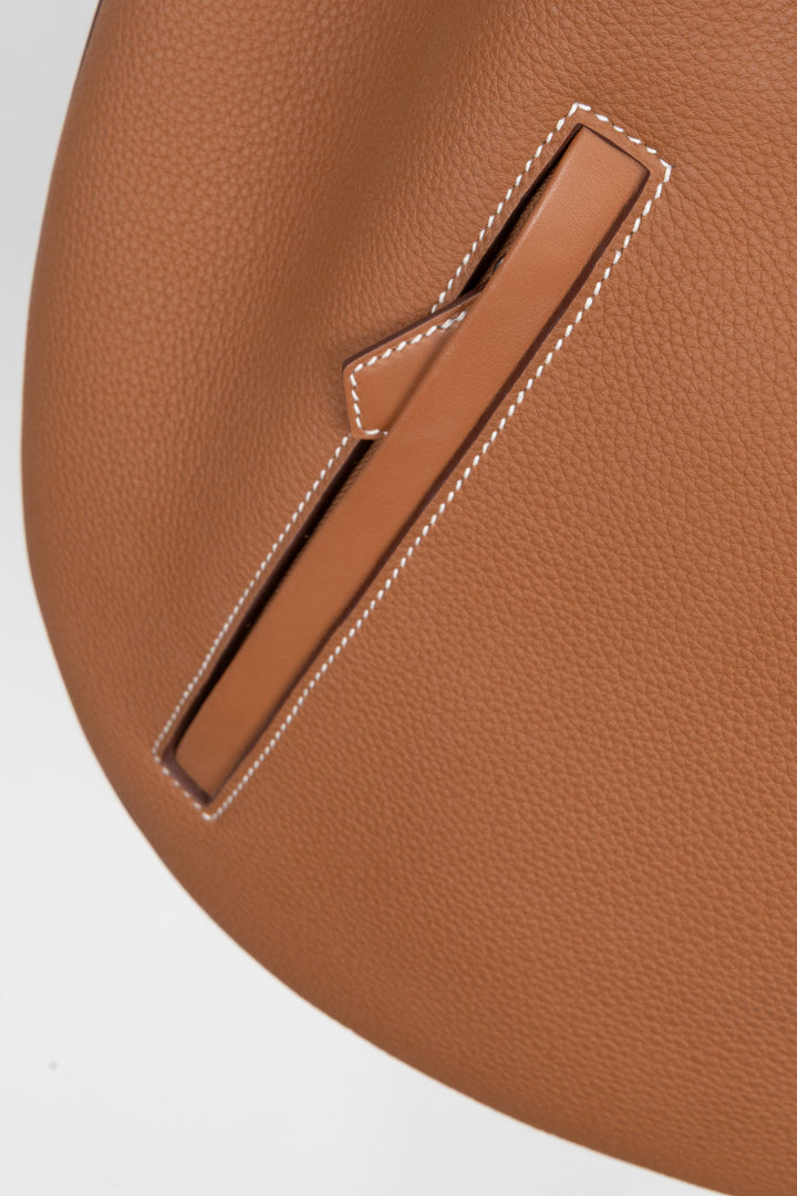 HERMÈS Sac Arçon en cuir Togo doré