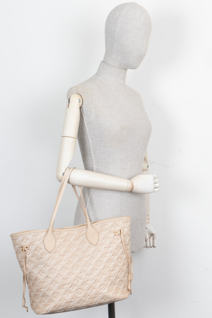 LOUIS VUITTON Stardust Empreinte Neverfull MM Leather Beige