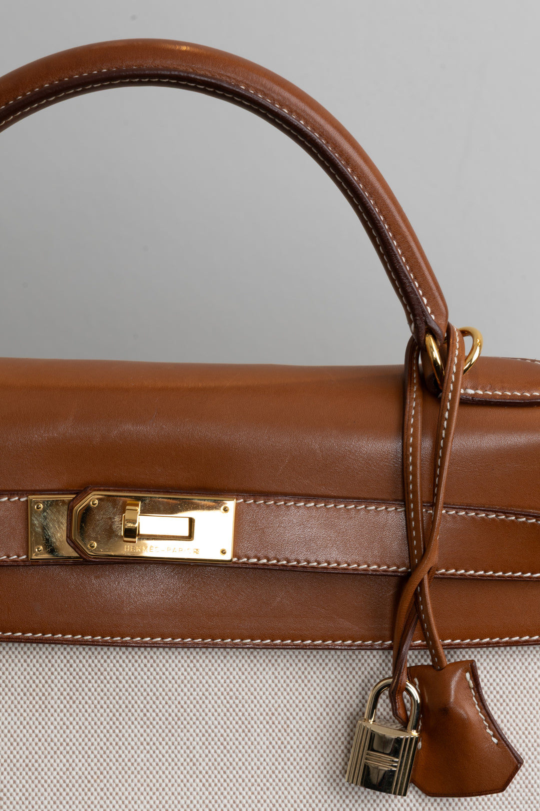 HERMÈS Kelly 40 Retourne Gold Barenia Toile H