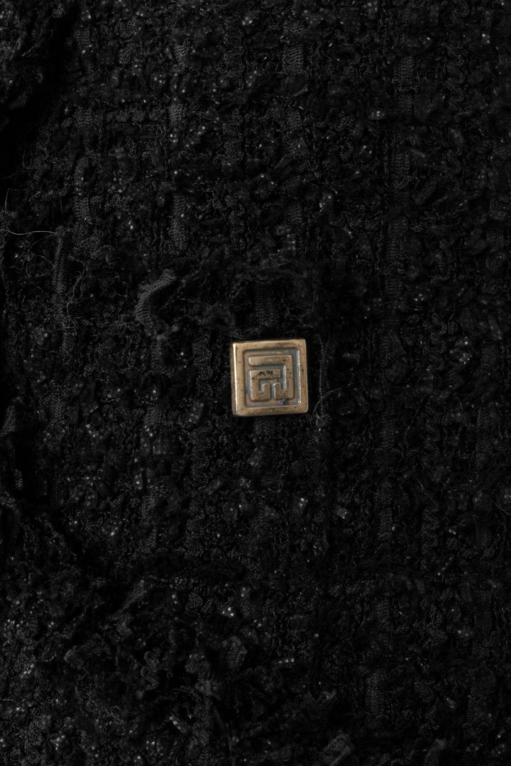 Mini-jupe plissée en tweed noir BALMAIN