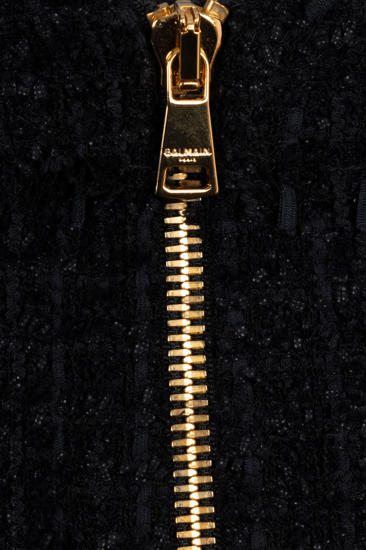 Mini-jupe plissée en tweed noir BALMAIN
