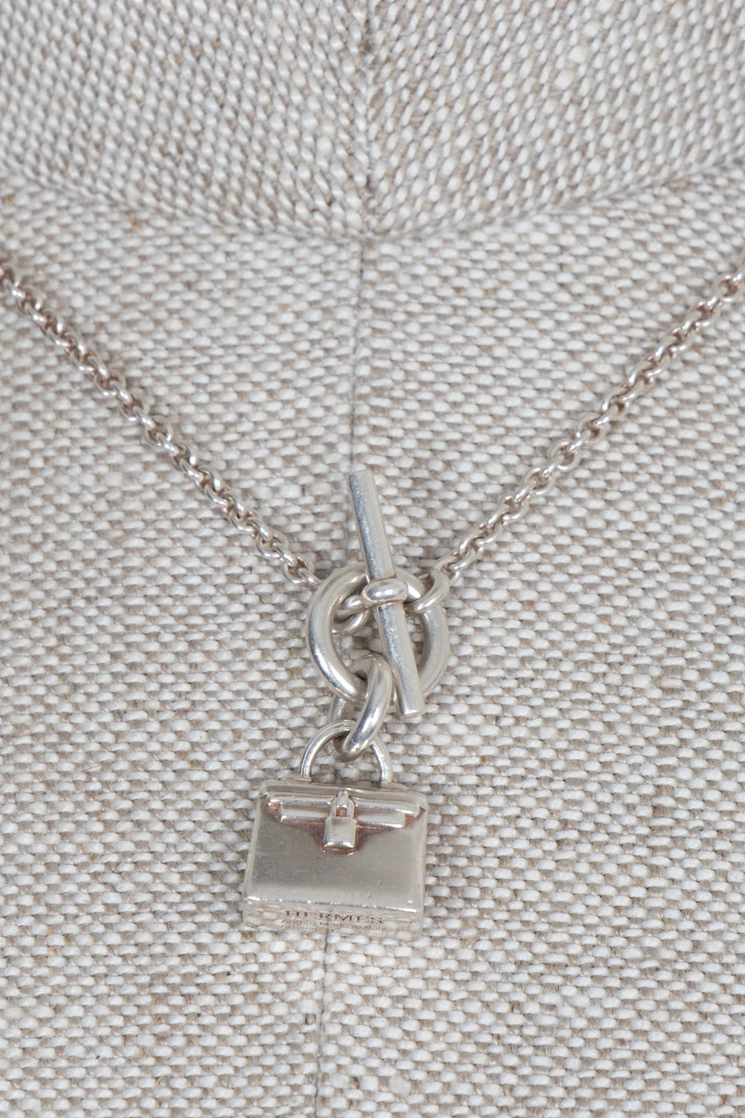 HERMÈS Kelly Amulette Necklace Silver