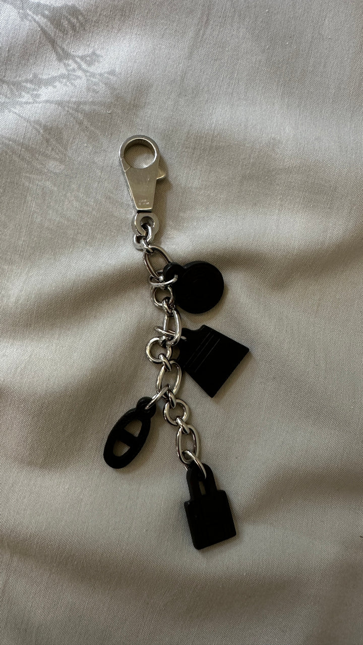 HERMÈS Olga Bag Charm Leather Black Silver