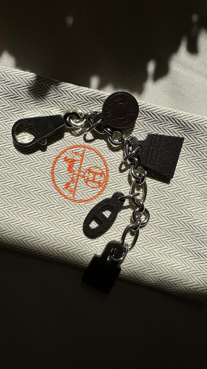 HERMÈS Olga Bag Charm Leather Black Silver