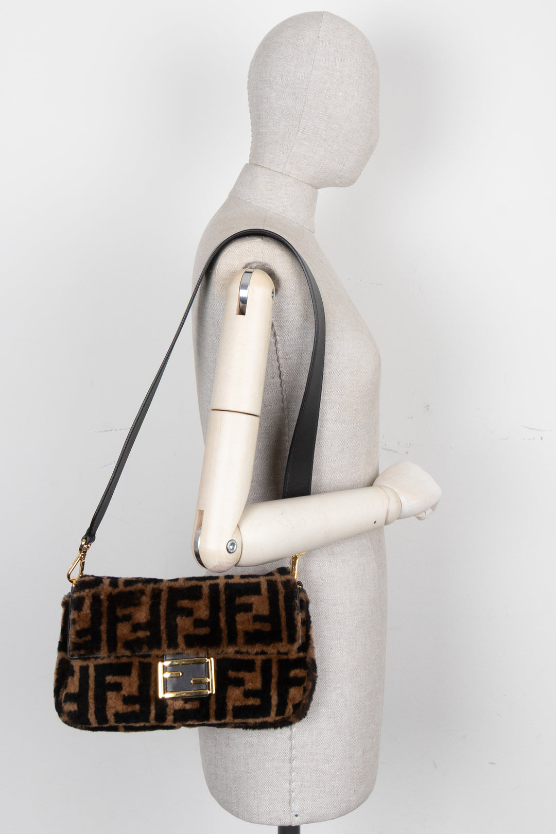FENDI Zucca Shearling Baguette Bag